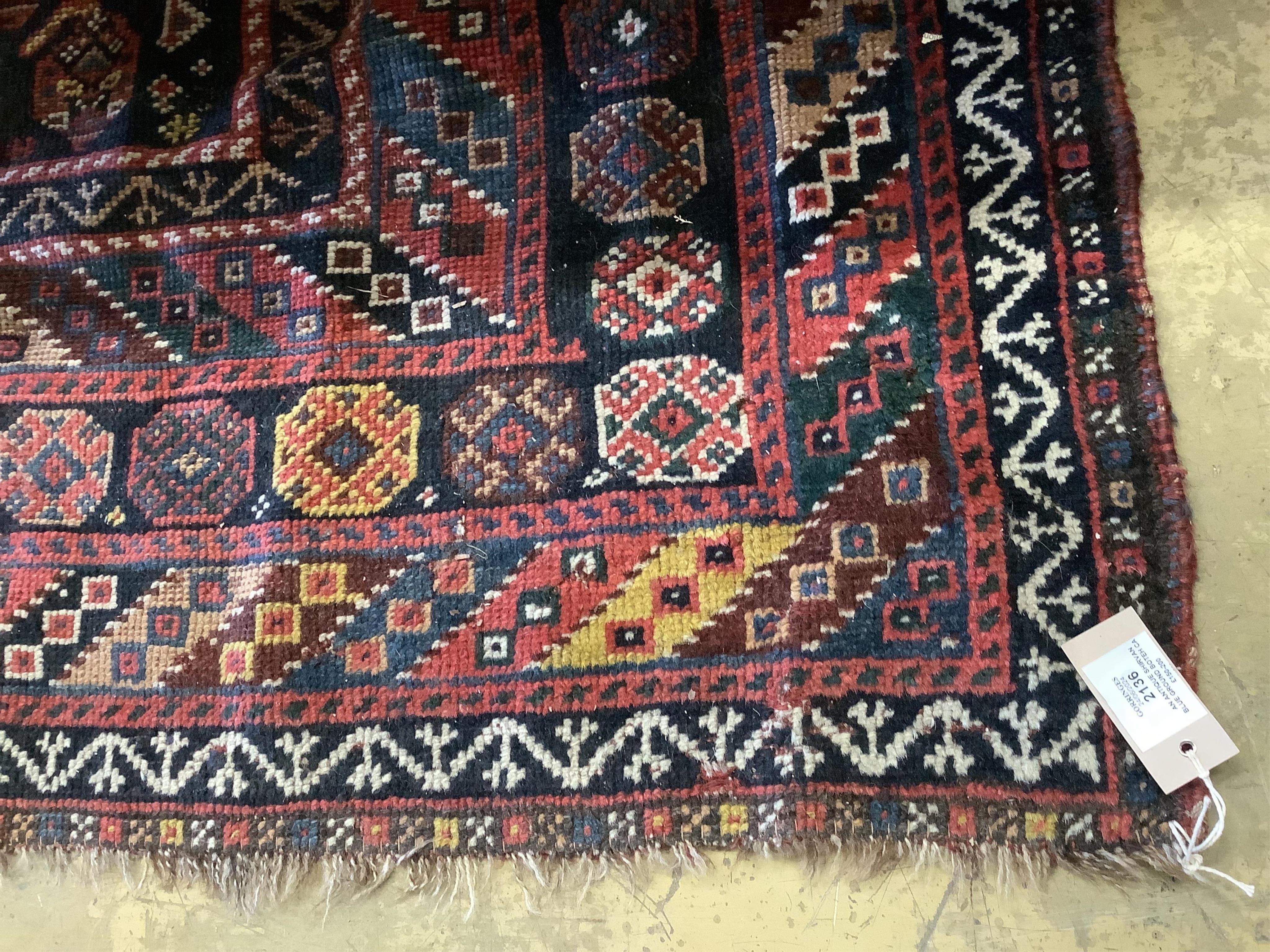An antique Shirvan blue ground Boteh carpet, 290 x 170cm. Condition - fair